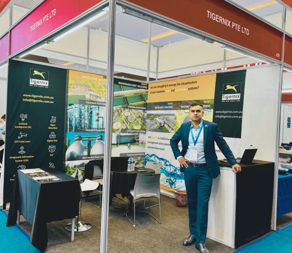 Tigernix CEO posing at the Indowater Booth (J09)